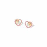 Tiny Jewels heart-shaped earrings with pink and gold finish on a white background