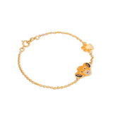 Tiny Jewels gold bracelet with a bear-shaped clasp on a white background