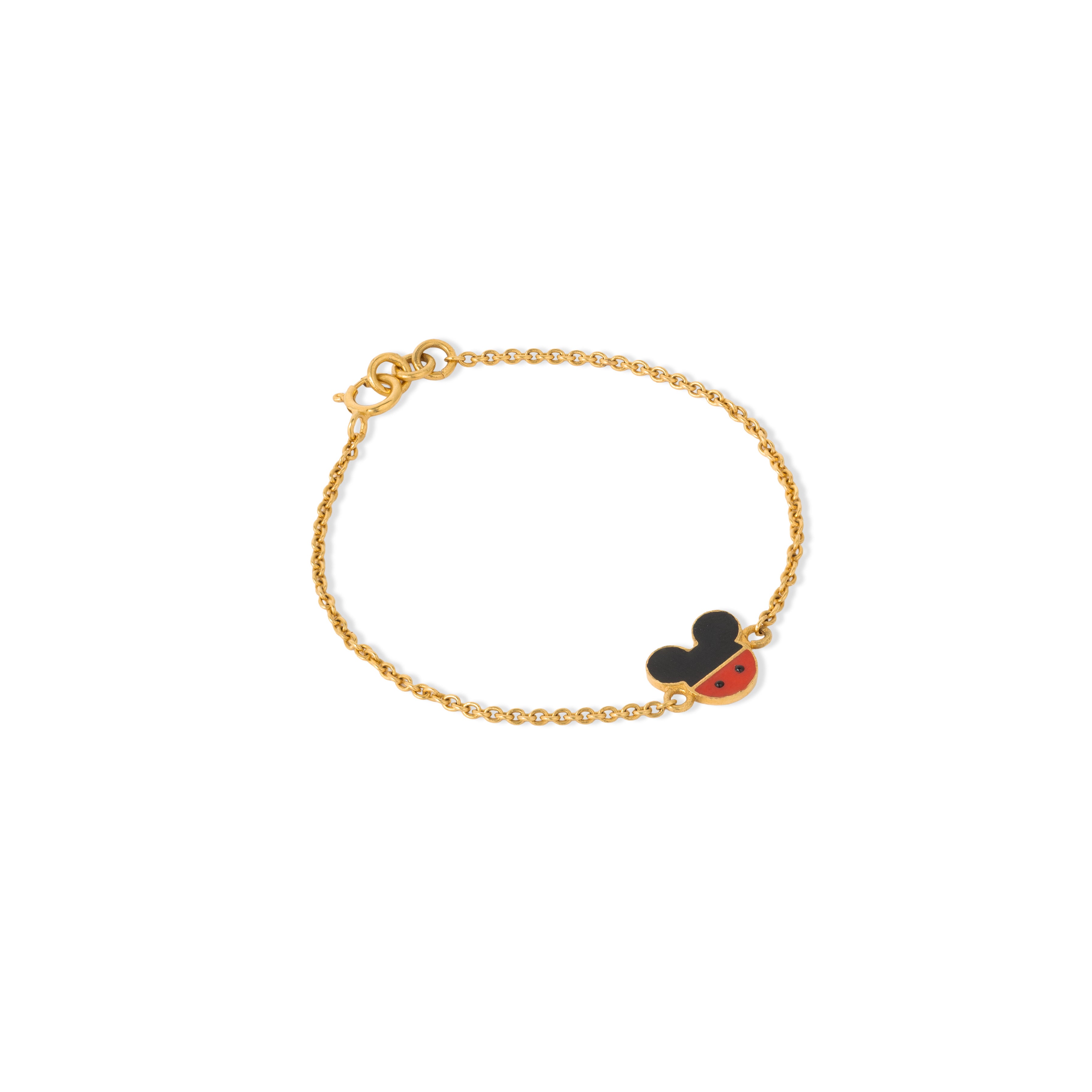 Tiny Jewels gold bracelet with a black and red heart charm on a white background