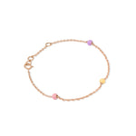 Tiny Jewels rose gold bracelet with colorful beads on a white background