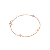 Tiny Jewels rose gold bracelet with colorful beads on a white background