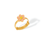 Tiny Jewels gold ring with a pink flower-shaped pendant on a white background