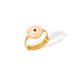 Tiny Jewels gold ring with a pink and black eye design on a white background