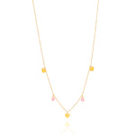 Tiny Jewels necklace with heart-shaped pendants on a white background