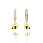 Tiny Jewels bee-shaped earrings with gold and black details on a white background