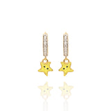 Tiny Jewels star-shaped earrings with gold and yellow colors on a white background