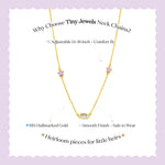 Gold necklace with pink gemstones on a light purple background, featuring text about the product.