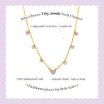 Tiny Jewels gold necklace with heart-shaped charms on a light purple background, featuring text about the product.
