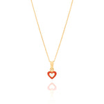 Tiny Jewels Gold pendant with a red heart-shaped design on a white background