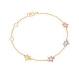 Tiny Jewels gold bracelet with star-shaped charms on a white background