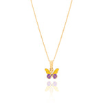 Tiny Jewels Butterfly pendant with gold frame, yellow wings, and purple body on a white background